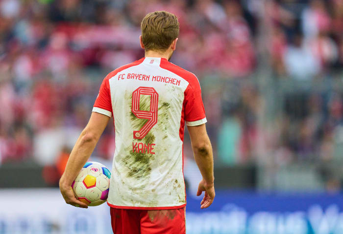 Harry Kane pictured holding the match ball after scoring a hat-trick for Bayern Munich in an 8-1 win over Mainz in the Bundesliga in March 2024